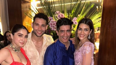 From left, Sharvari Wagh, Siddhant Chaturvedi, Manish Malhotra and Kriti Sanon. Photo: Instagram / manishmalhotra05