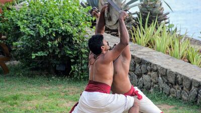 Weapons training starts with stance correction, followed by handling wooden weapons, then metallic weapons and finally barehanded combat. Kalpana Sunder for The National