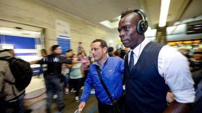 Italy forward Mario Balotelli arrives in Naples. Ciro Fusco / EPA