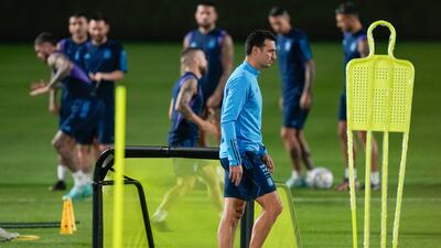 Coach Lionel Scaloni walks on the pitch. AP
