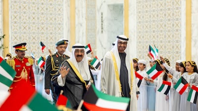 Sheikh Mohamed hosts a state reception for the Kuwaiti Emir. Ryan Carter / UAE Presidential Court