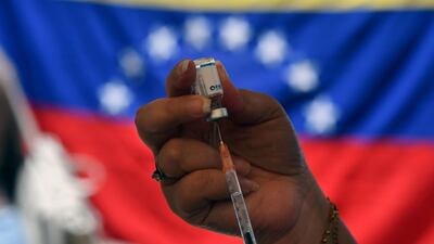 Venezuela has blamed the US 'blockade' for its slow vaccine distribution programme. AFP