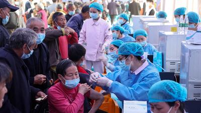 People receive the China National Biotec Group Covid-19 vaccine in Chongqing municipality in south-west China. AFP