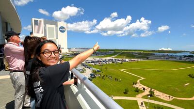 Alia Al Mansoori watches the SpaceX Falcon 9 rocket launch from Kennedy Space Center. Scott A Miller for The National