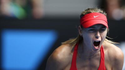 Maria Sharapova reacts during her victory over Eugenie Bouchard on Tuesday to reach the Australian Open semi-finals. Barbara Walton / EPA