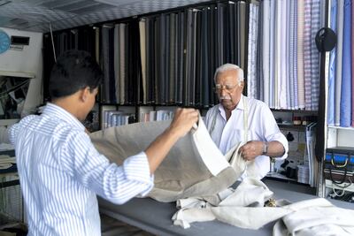 Mohammed Imtiaz at his shop just off Hamdan Street. Reem Mohammed / The National