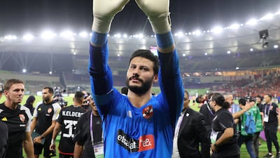 Al Ahly's Mohamed El Shenawy celebrates after the match. Reuters