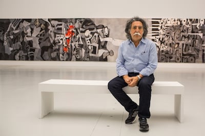 Al Azzawi with his painting Mission of Destruction (2004-2007) in Qatar's Mathaf: Arab Museum of Modern Art. Photo: Meem Gallery