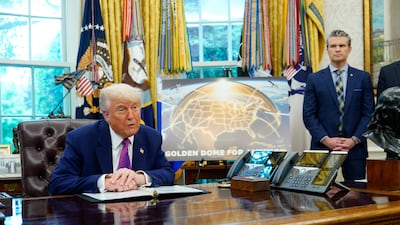 Mr Trump and Pete Hegseth, US Secretary of War, in the Oval Office of the White House, promoting the 'Golden Dome' missile-defence shield. Getty Images