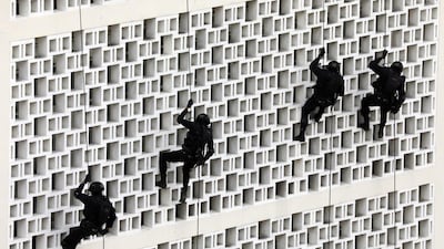 Members of the Sri Lanka Army Special Forces Regiment participate in a mock rescue and raid operation during the ongoing 'Ex Cormorant Strike X 2019' in Colombo, Sri Lanka. EPA