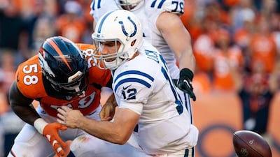 Denver Broncos outside linebacker Von Miller sacks and forces a fumble against Indianapolis Colts quarterback Andrew Luck. Isaiah J. Downing / USA Today
