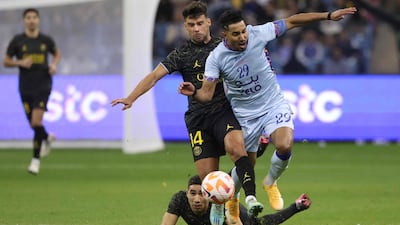 Juan Bernat fouls Riyadh All-Star's Saudi midfielder Salem al-Dawsari, leading to a red card. AFP