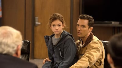 Mackenzie Foy, left, plays the young daughter of Matthew McConaughey, right, who stars as a former Nasa pilot in Interstellar. Paramount Pictures