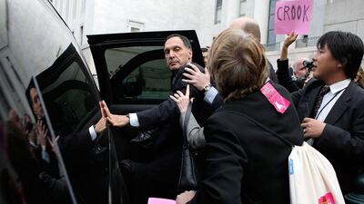 Richard Fuld Jr, chief executive of Lehman Brothers, is surrounded by protesters leaving a hearing at the US House Oversight and Government Reform Committee in Washington DC, in October, 2008, after the bank’s collapse and the ensuing global financial crisis. Alex Wong / Getty Images.