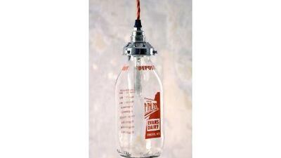 Vintage milk bottle light, prices vary. Courtesy of Baileys Home and Garden