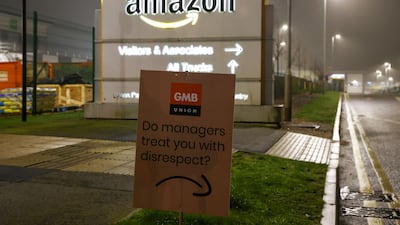 A GMB union banner reads: 'Do managers treat you with disrespect?' Bloomberg