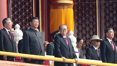Chinese President Xi Jinping, second from left, with former presidents Jiang Zemin, center right, and Hu Jintao, left. AP