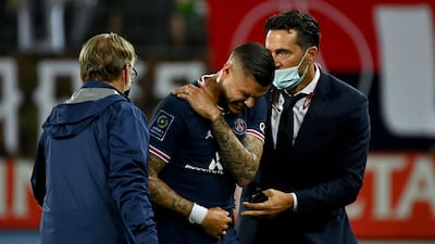 PSG Argentinian forward Mauro Icardi leaves the pitch after picking up an injury. AFP