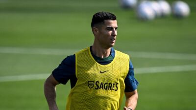 Cristiano Ronaldo takes part in a training session at Shahaniya Sports Club. AFP