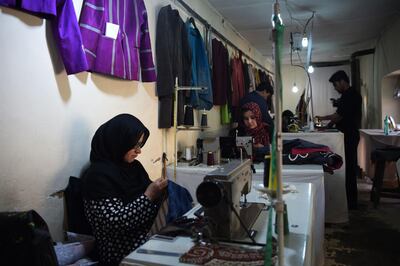 Afghan tailors sewing clothes at Zarif Design House
