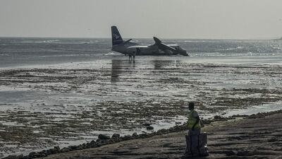 A StarSky airliner carrying 55 people after it crash-landed while taking off in Mogadishu, Somalia. No injuries were reported. AFP