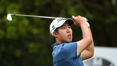 An Byeong-Hun of South Korea tees off on the 14th hole during Day 4 of the BMW PGA Championship at Wentworth on May 24, 2015 in Virginia Water, England. (Photo by Ross Kinnaird/Getty Images)