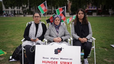 Three Afghan women have been on hunger strike since Thursday in protest against the Taliban takeover of Afghanistan and have kept a vigil in Parliament Square, London. PA