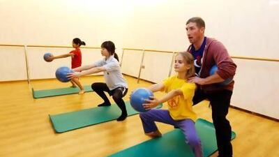 Paul Thornley, right, leads a youth Pilates class at Real Pilates in Dubai. The courses target coordination and balance. Sarah Dea / The National