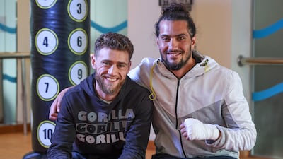 Dubai-based Jordanian boxer Bader Samreen, left, with older brother and training partner Hesham ahead of his Rising Stars Arabia fight this weekend in Abu Dhabi. Victor Besa / The National