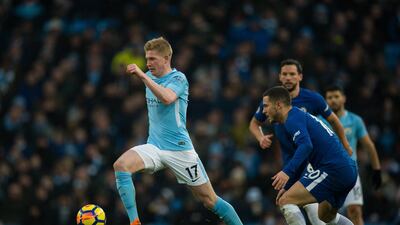 Kevin De Bruyne, left, believes it is hard to pick between him and Liverpool's Mohamed Salah for the Player of the Year award. Peter Powell / EPA
