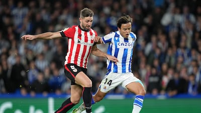 Takefusa Kubo of Real Sociedad beats Yeray of Athletic Club to the ball in a La Liga match. Getty