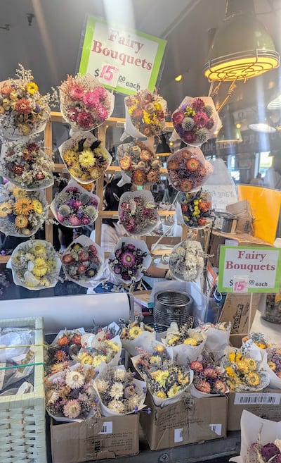 While most vendors hadn't opened early in the morning, the bouquets of flowers were already on display. Hayley Kadrou / The National