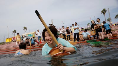 Volunteers practice swimming ahead of Shirahama Ama matsuri in Minamiboso, Chiba Prefecture, Japan.