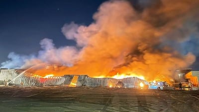 Firefighters attend to a fire at an oil factory in the industrial area of Al Jazirah Al Hamra, Ras Al Khamiah. All photos: Ras Al Khamiah Civil Defence Instagram
