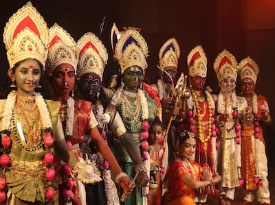 Indian folk artists in the various avatars of Durga for Dussehra celebrations. EPA