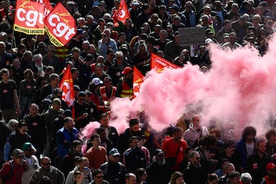 Protesters wave flags of the CGT union during a demonstration in Marseille. AFP