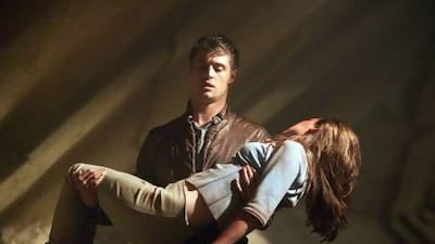 A scene from the movie adaptation of Stephenie Meyer's The Host, starring Max Irons and Saoirse Ronan. Alan Markfield / Open Road Films / AP Photo