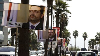 Posters of Saad Hariri, with a caption that reads: "#We_are_all_Saad", hang along Beirut's corniche on November 10, 2017. Joseph Eid / AFP