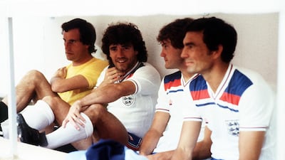 File photo dated 01-07-1982 - The substitutes' bench during England's World Cup match against Spain in Madrid. (Left to Right) Goalkeeper Ray Clemence, injured captain Kevin Keegan, Glenn Hoddle and Trevor Brooking. PA Photo
