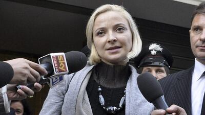 Domnica Cemortan, from Moldova, leaves court after testifying in a hearing in the trial of Captain Francesco Schettino, in Grosseto, Italy. The Moldovan dancer, who was on the bridge when the Costa Concordia crashed into the reef, has testified she was the lover of Captain Schettino. Giacomo Aprili / AP Photo