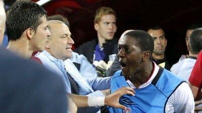 Marvin Sordell of England reacts angrily on the sidelines of the game.