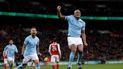 Manchester City's Vincent Kompany celebrates scoring City's second goal in a 3-0 win over Arsenal in the League Cup final at Wembley. Carl Recine / Reuters