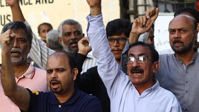 Journalists hold a protest in Karachi, Pakistan, following the death of Sharif in Kenya. Sharif, who was a staunch critic of the all-powerful military establishment, fled the native country to avoid arrest over sedition charges. EPA