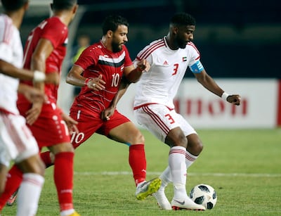 UAE, in white, came close but were unable to beat Syria in their Asian Games opener. AP Photo