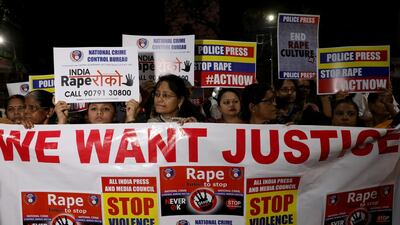 Women stage a protest in the Indian city of Kolkata December 4, 2019 over the gang rape and murder of woman in southern India a week earlier. Reuters