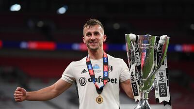 Goalscorer Joe Bryan of Fulham celebrates with the trophy. Getty