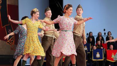 Perfomers dressed as soldiers take part during an event to commemorate the 75th anniversary of the D-Day landings, in Portsmouth, southern England. AFP