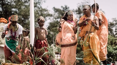 A group of youth adorning various Hindu gods and godesses gesture as they stand on a float during a street parade as part of the preparations of the two-days celebrations for the Diwali Hindu festival (Festival of Lights) at the old Drive-Inn in Durban, on October 19, 2019. AFP