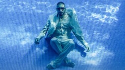 Mohamed Faisal Mostafa wears a shirt, double-breasted jacket and trousers by Fendi. Watch and sunglasses, Mohamed’s own. Chris Whiteoak / The National