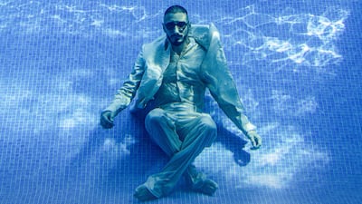Mohamed Faisal Mostafa wears a shirt, double-breasted jacket and trousers by Fendi. Watch and sunglasses, Mohamed’s own. Chris Whiteoak / The National